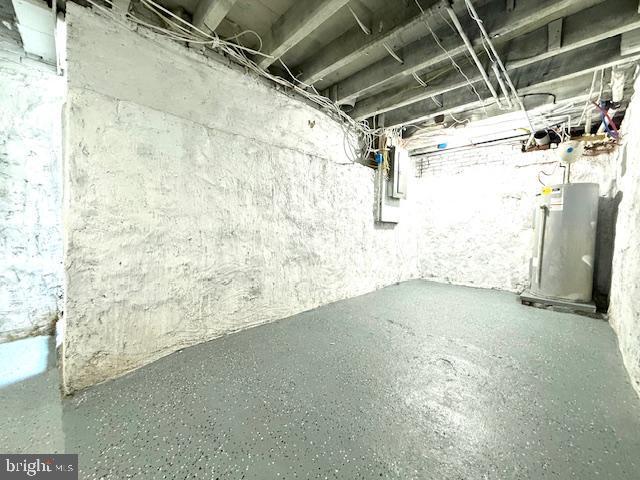 1343 Muhlenberg St, Reading, PA 19602 - unfinished basement featuring water heater