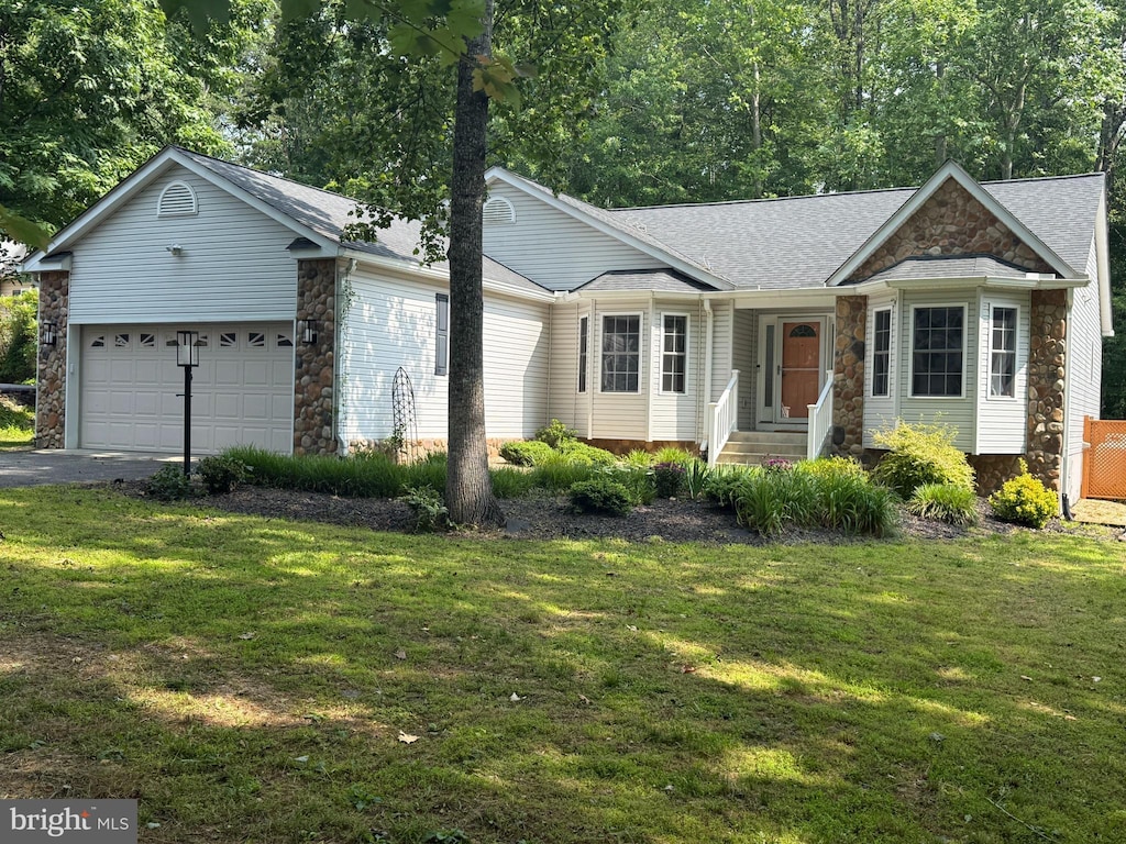 910 Confederate Dr, Locust Grove, VA 22508 - ranch-style home featuring stone siding, a garage, asphalt driveway, and a front yard