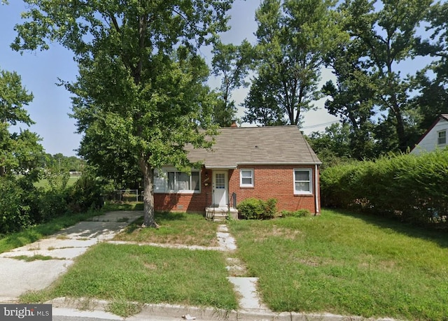 5012 Blackfoot Pl, College Park, MD 20740 - view of front of property featuring driveway, a front lawn, and brick siding