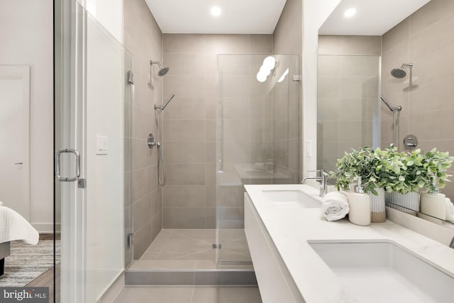 2647 41st St NW Unit 3, Washington, DC 20007 - bathroom with a shower stall, double vanity, and recessed lighting