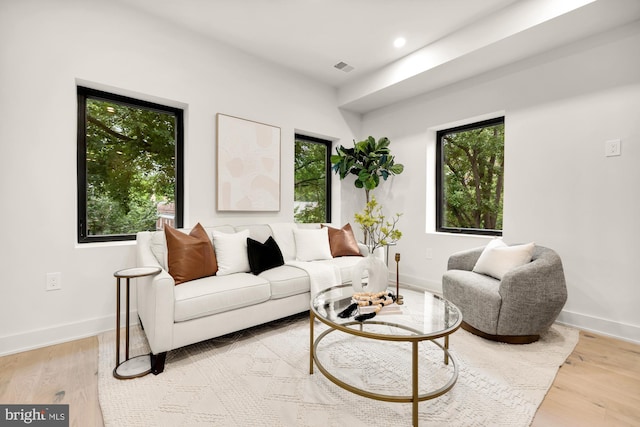 2647 41st St NW Unit 3, Washington, DC 20007 - living area with healthy amount of natural light, light wood-style flooring, baseboards, and recessed lighting