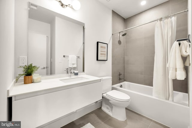 2647 41st St NW Unit 3, Washington, DC 20007 - bathroom featuring shower / bath combo with shower curtain, vanity, toilet, tile patterned floors, and recessed lighting