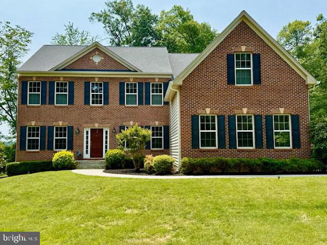 2425 Ellies Way W, Friendship, MD 21794 - view of front of property with a front yard and brick siding