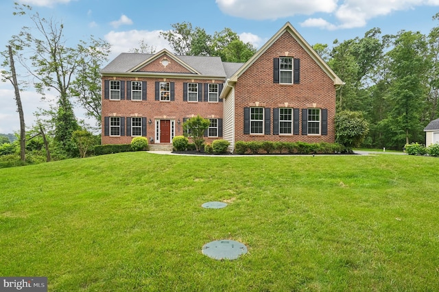 2425 Ellies Way W, Friendship, MD 21794 - view of front of property with brick siding and a front lawn
