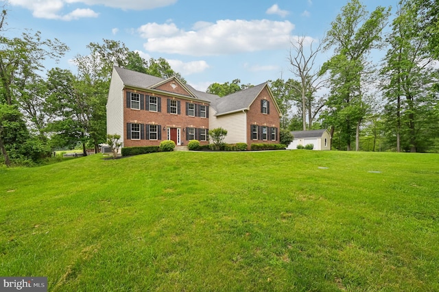 2425 Ellies Way W, Friendship, MD 21794 - colonial house with brick siding and a front yard