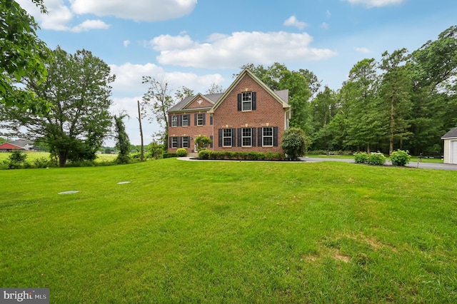 2425 Ellies Way W, Friendship, MD 21794 - colonial house featuring brick siding and a front yard