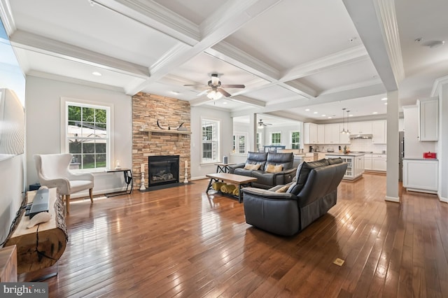 2425 Ellies Way W, Friendship, MD 21794 - living area with a ceiling fan, beam ceiling, wood-type flooring, a fireplace, and coffered ceiling