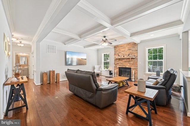 2425 Ellies Way W, Friendship, MD 21794 - living room with dark wood-style floors, beam ceiling, ceiling fan, crown molding, and a fireplace