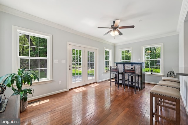 2425 Ellies Way W, Friendship, MD 21794 - living room with ceiling fan, baseboards, hardwood / wood-style flooring, and ornamental molding