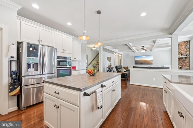 2425 Ellies Way W, Friendship, MD 21794 - kitchen with stainless steel appliances, dark wood-type flooring, a ceiling fan, recessed lighting, and coffered ceiling
