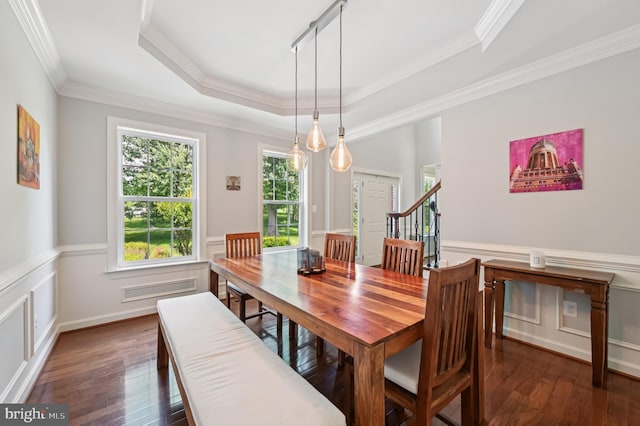 2425 Ellies Way W, Friendship, MD 21794 - dining space featuring dark wood finished floors, wainscoting, a raised ceiling, and crown molding