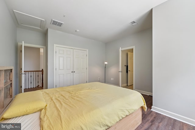 2425 Ellies Way W, Friendship, MD 21794 - bedroom with a closet, baseboards, dark wood-style flooring, and attic access