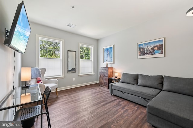 2425 Ellies Way W, Friendship, MD 21794 - living area with dark wood-style flooring and baseboards