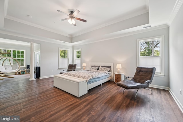 2425 Ellies Way W, Friendship, MD 21794 - bedroom with a tray ceiling, dark wood finished floors, decorative columns, crown molding, and baseboards