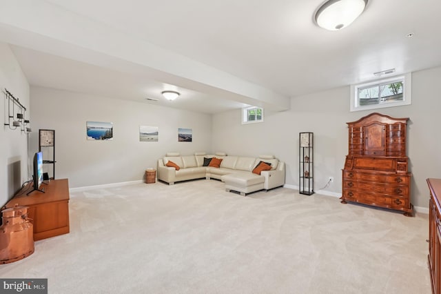 2425 Ellies Way W, Friendship, MD 21794 - living area featuring light carpet, baseboards, and plenty of natural light