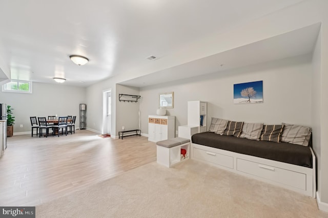 2425 Ellies Way W, Friendship, MD 21794 - living room featuring baseboards and wood finished floors