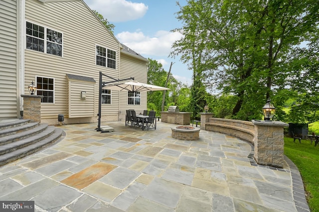 2425 Ellies Way W, Friendship, MD 21794 - view of patio with a fire pit, outdoor dining area, and area for grilling
