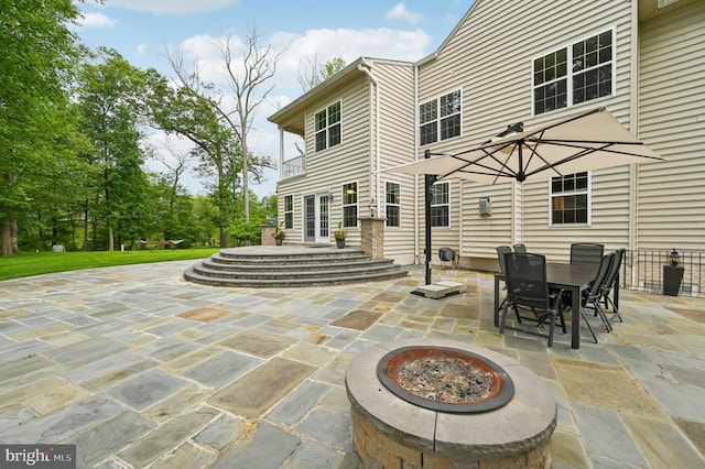 2425 Ellies Way W, Friendship, MD 21794 - view of patio with an outdoor fire pit, french doors, and outdoor dining area