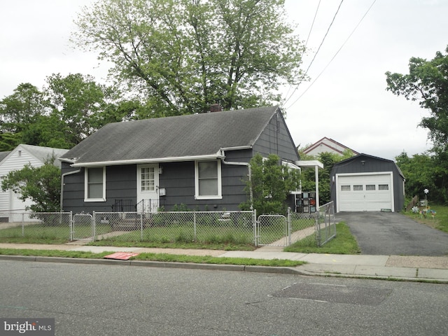 928 Linden, Pleasantville, NJ 08232 - view of front of property with a gate, a chimney, an outdoor structure, a garage, and a fenced front yard