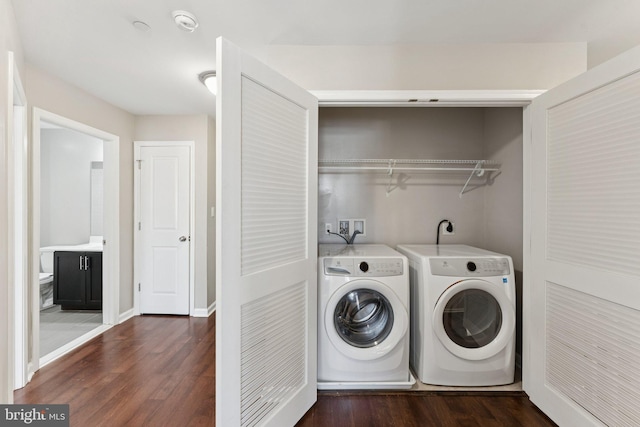 412 Woodcrest Dr SE Unit 412B, Washington, DC 20032 - laundry area featuring washer and dryer and wood finished floors