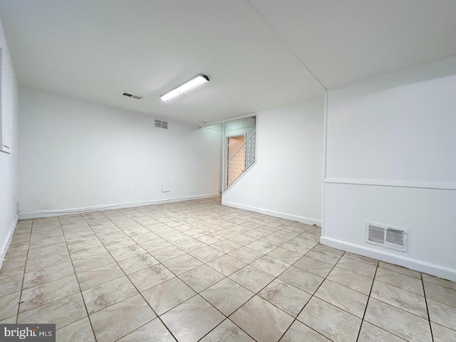 8432 Ravenswood Rd, New Carrollton, MD 20784 - empty room featuring baseboards and tile patterned flooring