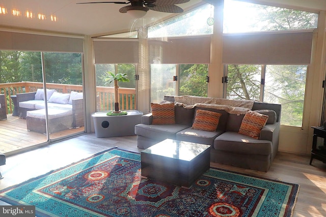 467 Luella Dr, Kutztown, PA 19530 - sunroom / solarium featuring outdoor lounge area, ceiling fan, a deck, wood finished floors, and vaulted ceiling