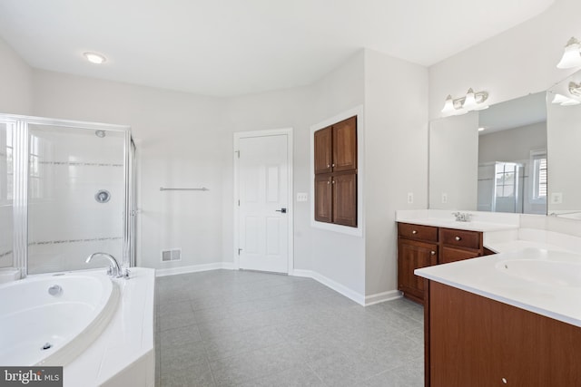 6513 Debhill Ln, Gainesville, VA 20155 - full bathroom with two vanities, a shower stall, a bath, and baseboards