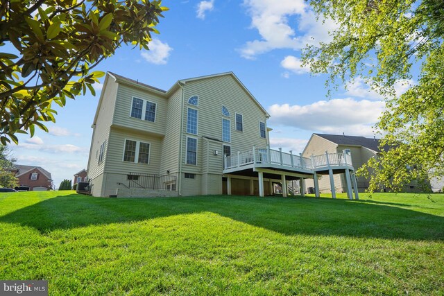 6513 Debhill Ln, Gainesville, VA 20155 - rear view of house featuring a wooden deck and a yard