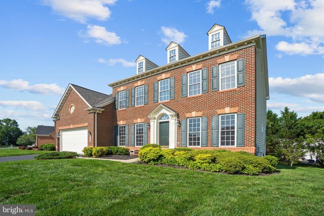 6513 Debhill Ln, Gainesville, VA 20155 - colonial house featuring brick siding, a front lawn, and an attached garage