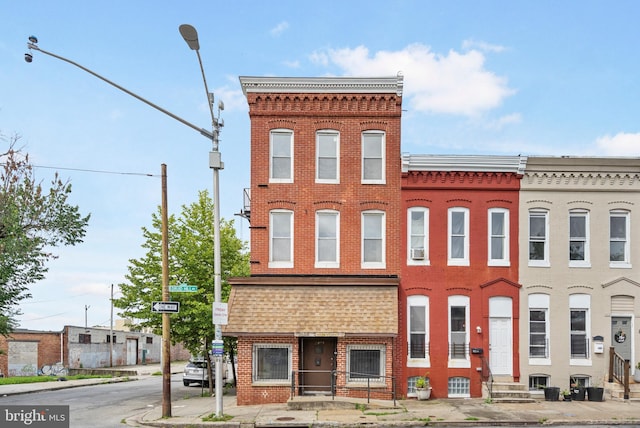 2400 Druid Hill Ave, Baltimore, MD 21217 - view of front facade featuring brick siding and entry steps