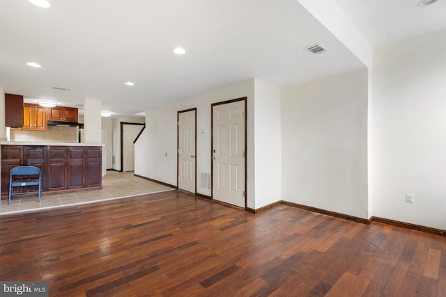 2400 Druid Hill Ave, Baltimore, MD 21217 - unfurnished living room featuring light wood finished floors and recessed lighting