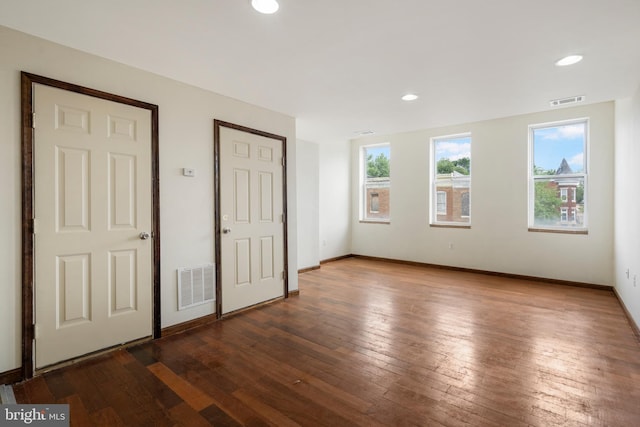 2400 Druid Hill Ave, Baltimore, MD 21217 - unfurnished bedroom featuring hardwood / wood-style floors and recessed lighting