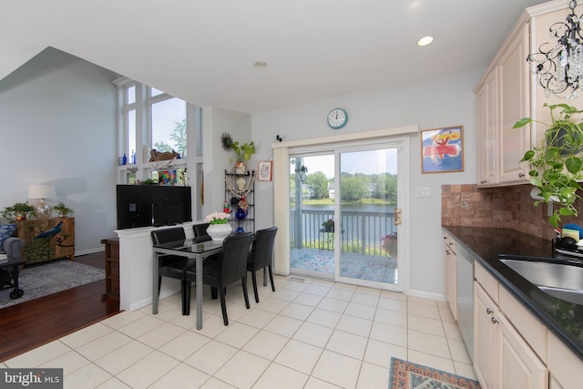 1504 Champlain Dr, Voorhees, NJ 08043 - dining space featuring a water view, plenty of natural light, recessed lighting, baseboards, and light tile patterned floors