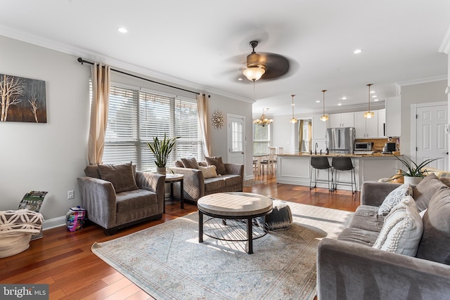 11 Bancroft Ln, Hainesport, NJ 08036 - living room featuring a ceiling fan, hardwood / wood-style flooring, crown molding, recessed lighting, and baseboards