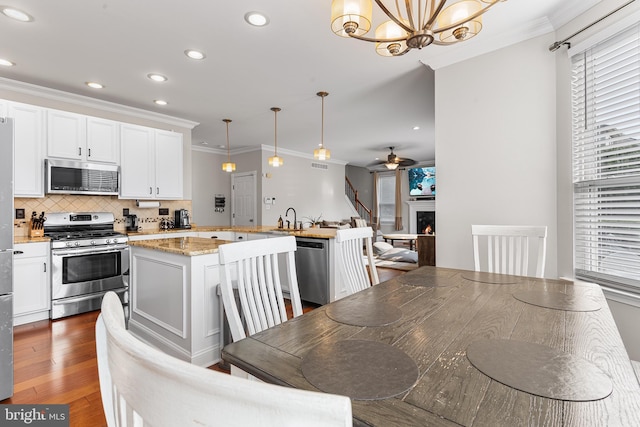 11 Bancroft Ln, Hainesport, NJ 08036 - dining space with recessed lighting, a ceiling fan, crown molding, healthy amount of natural light, and wood finished floors