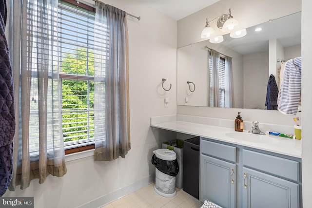 11 Bancroft Ln, Hainesport, NJ 08036 - bathroom featuring plenty of natural light, vanity, tile patterned floors, and baseboards
