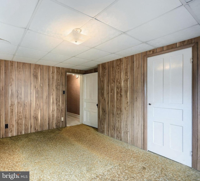 770 Baltimore St, Hanover, PA 17331 - unfurnished room with wooden walls, carpet, and a drop ceiling