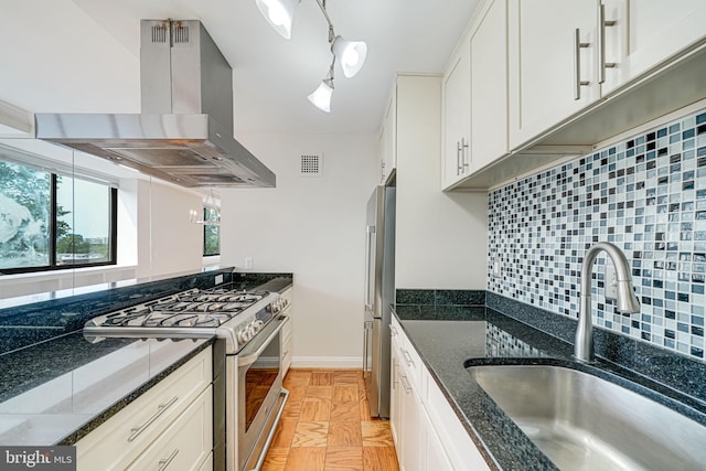 4390 Lorcom Ln Unit 810, Arlington, VA 22207 - kitchen with island exhaust hood, a sink, appliances with stainless steel finishes, tasteful backsplash, and white cabinets