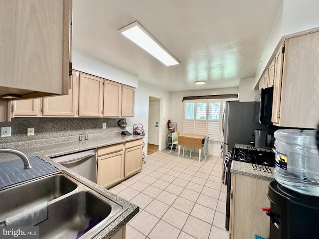 211 Franklin Ave, Berlin, NJ 08009 - kitchen featuring stainless steel appliances, light tile patterned floors, light brown cabinets, and light countertops