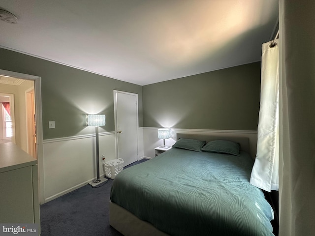 211 Franklin Ave, Berlin, NJ 08009 - bedroom with dark carpet and wainscoting