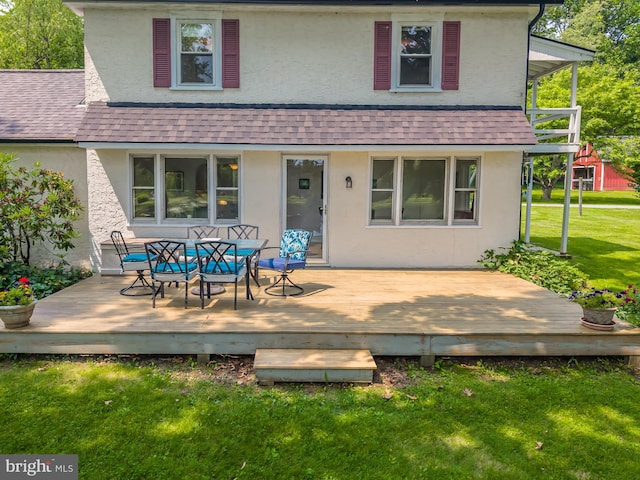 1034-1040 Twin County Rd, Honey Brook, PA 19344 - rear view of house featuring a shingled roof and stucco siding
