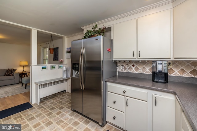 1034-1040 Twin County Rd, Honey Brook, PA 19344 - kitchen with stainless steel refrigerator with ice dispenser, backsplash, dark countertops, and white cabinetry