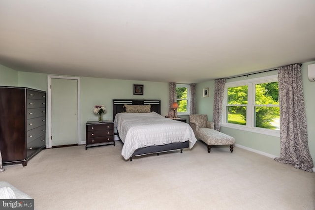 1034-1040 Twin County Rd, Honey Brook, PA 19344 - bedroom with baseboards, light colored carpet, and a wall mounted AC