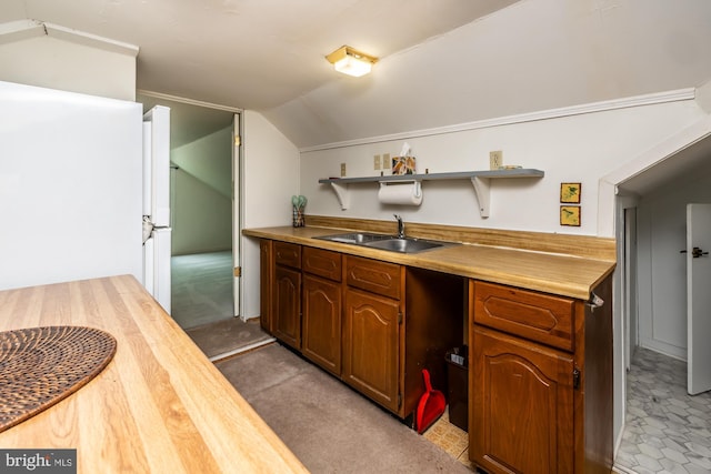 1034-1040 Twin County Rd, Honey Brook, PA 19344 - kitchen featuring a sink, vaulted ceiling, open shelves, and wooden counters