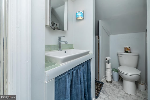 1034-1040 Twin County Rd, Honey Brook, PA 19344 - bathroom featuring vanity, toilet, and tile patterned floors