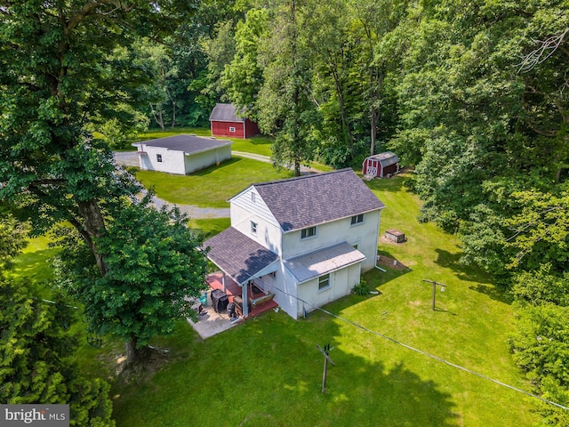 1034-1040 Twin County Rd, Honey Brook, PA 19344 - aerial view of property and surrounding area with a heavily wooded area