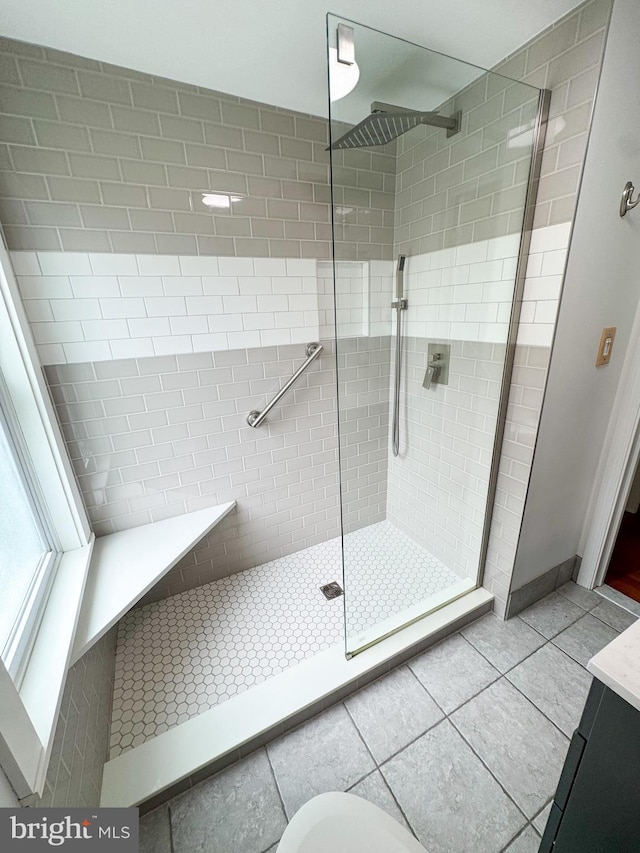 117 E Montgomery Ave, Hatboro, PA 19040 - bathroom with a shower stall, tile patterned floors, and vanity