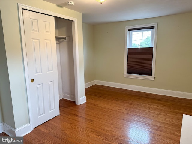 117 E Montgomery Ave, Hatboro, PA 19040 - unfurnished bedroom featuring wood finished floors, a closet, and baseboards