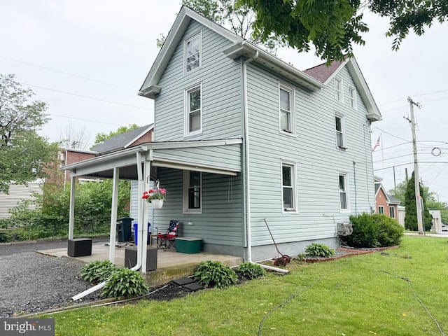 117 E Montgomery Ave, Hatboro, PA 19040 - rear view of property featuring a yard