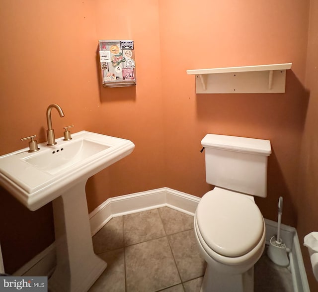 117 E Montgomery Ave, Hatboro, PA 19040 - bathroom with toilet, baseboards, and tile patterned flooring
